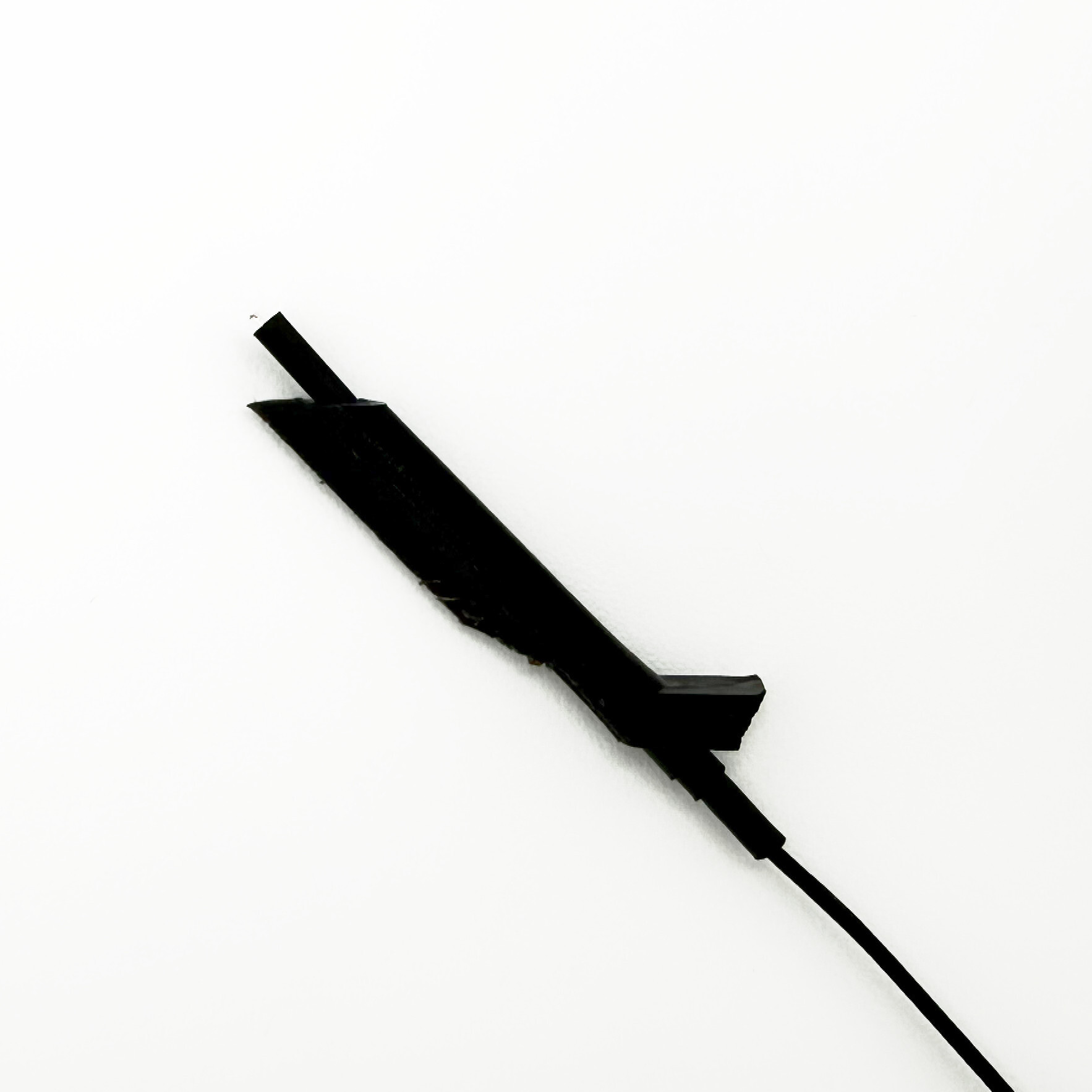 Heat shrink covering antenna beyond the fairing